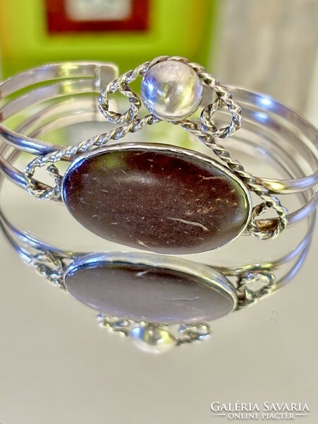 Stunning silver bangle with reddish brown mineral stone