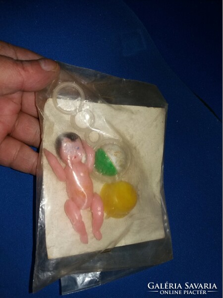 Retro packaged toy tiny baby with rattle and potty, unopened plastic toy as shown in the pictures