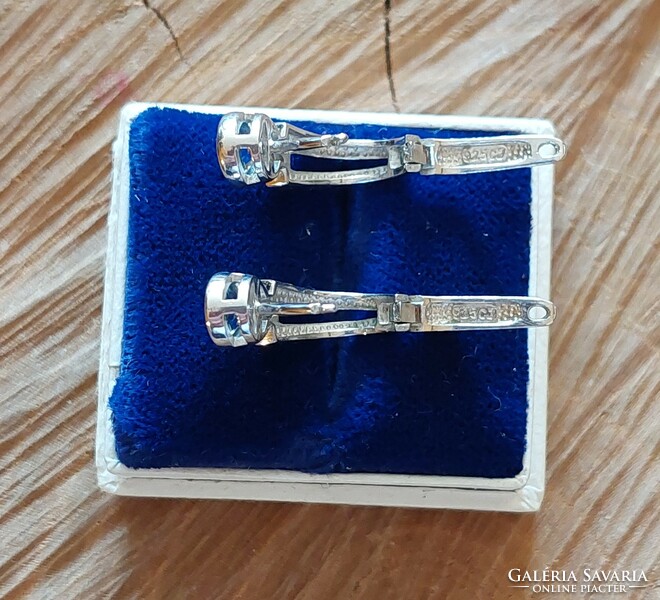 Silver earrings with light blue and white zirconia stones