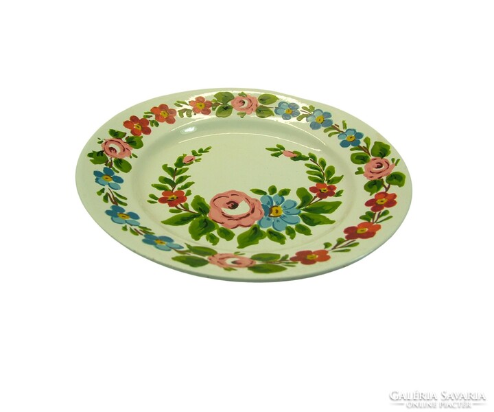 Marked granite wall decorative plate with floral folk motif