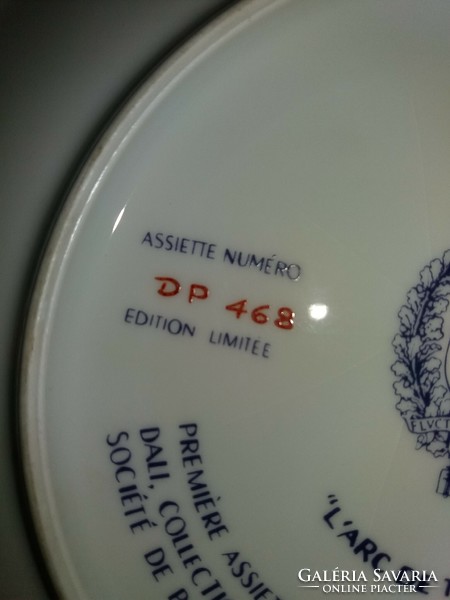 1970. Limoges French porcelain plate decorated with a painting by Luis Dali is the 18 cm collector of the Triumphal Arch