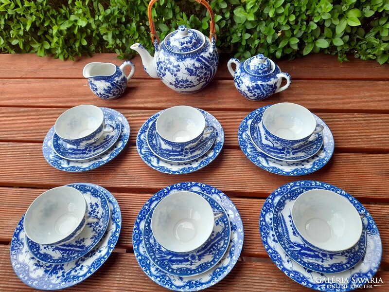 Six-person, 24-piece (Japanese) cherry blossom eggshell porcelain tea set.