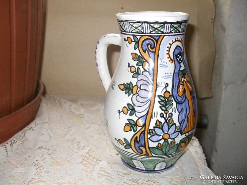 Old hand-painted jug with a picture of a saint. For sale!