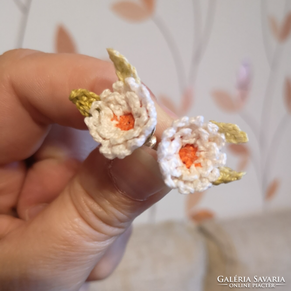 Earrings made with microcrochet are white