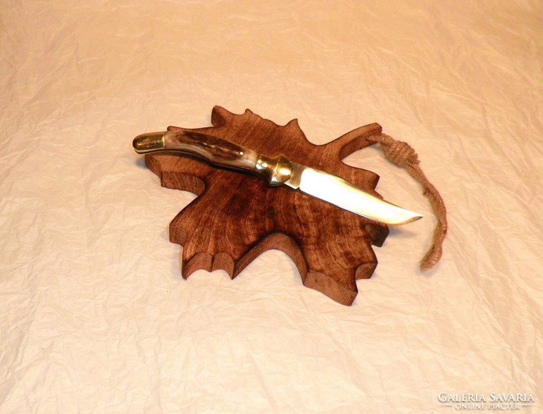 Curved head knife, from a collection.