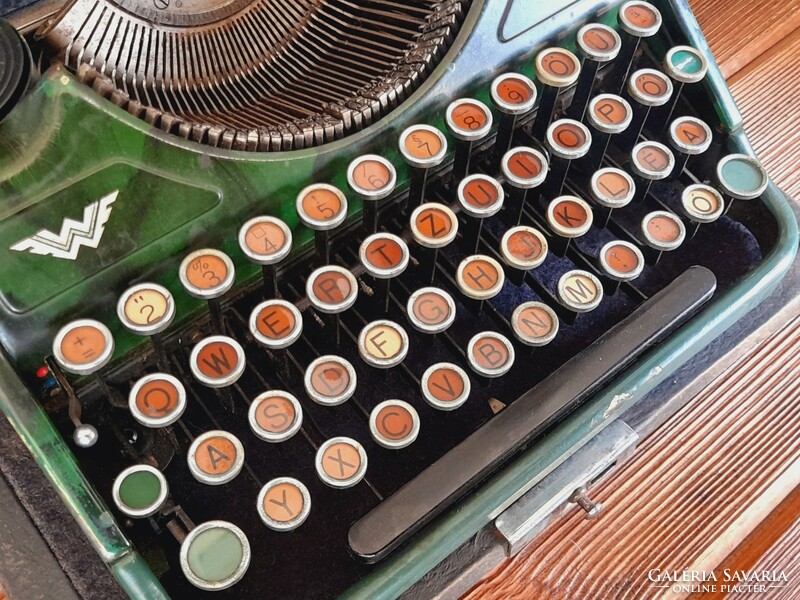 Old continental 350 green typewriter, works