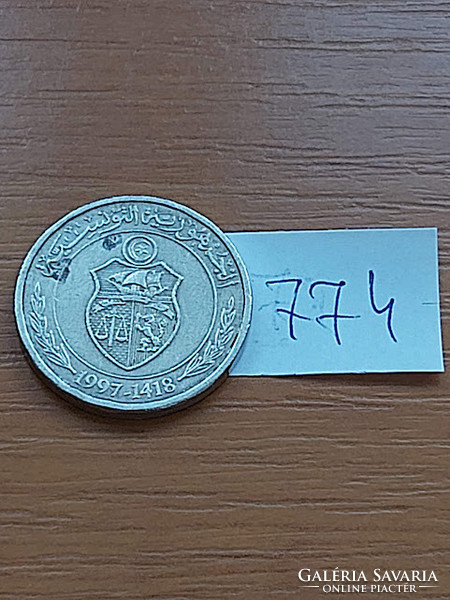 Tunisia 1/2 dinar 1997 1418 copper-nickel, orange 774