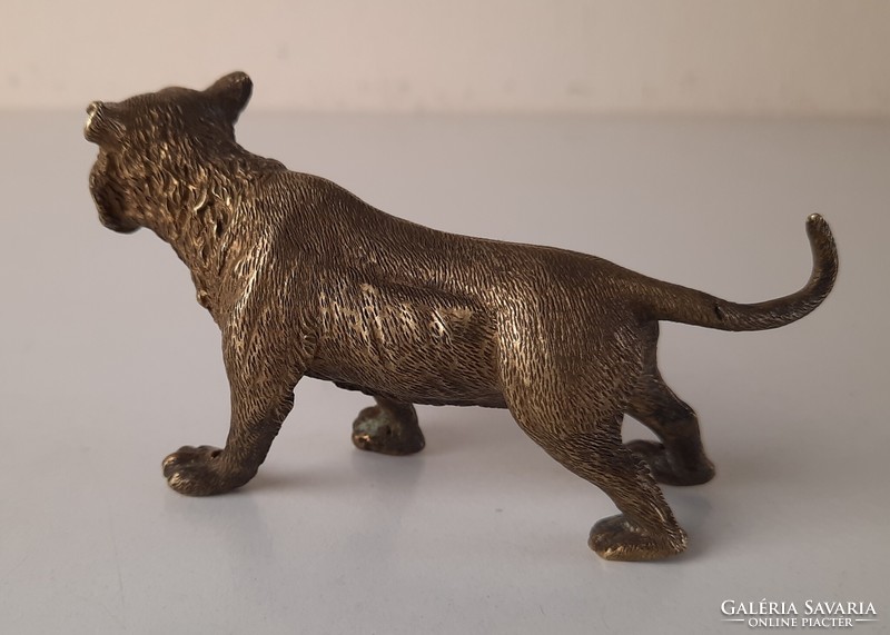Antique bronze small lion statue