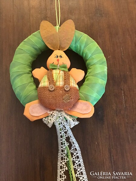 Bunny door knocker, wreath. Green silk base. Size: 25 cm with lace decoration.
