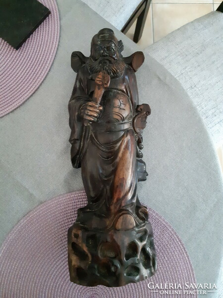 Eastern mythological figure made of hardwood