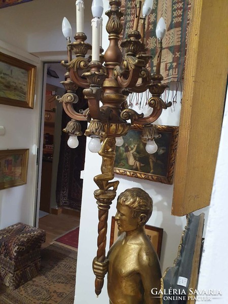 190 cm high 2 man-shaped standing lamp made of wood. 13 Combustible. Very nicely carved and gilded.
