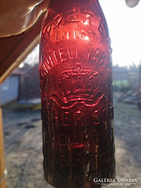 A rarer beer bottle with rips.