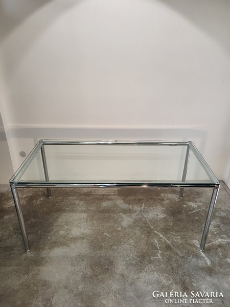 Modern, German dining table with chrome glass tubular frame