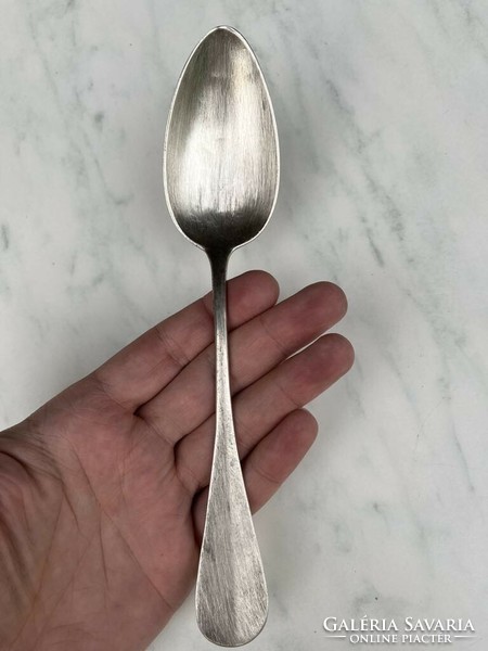 Marked silver spoon
