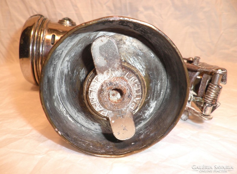 Old carbide bicycle lamp.