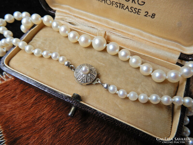 Is it real freshwater? String of pearls with 8 carat art deco style gold clasp