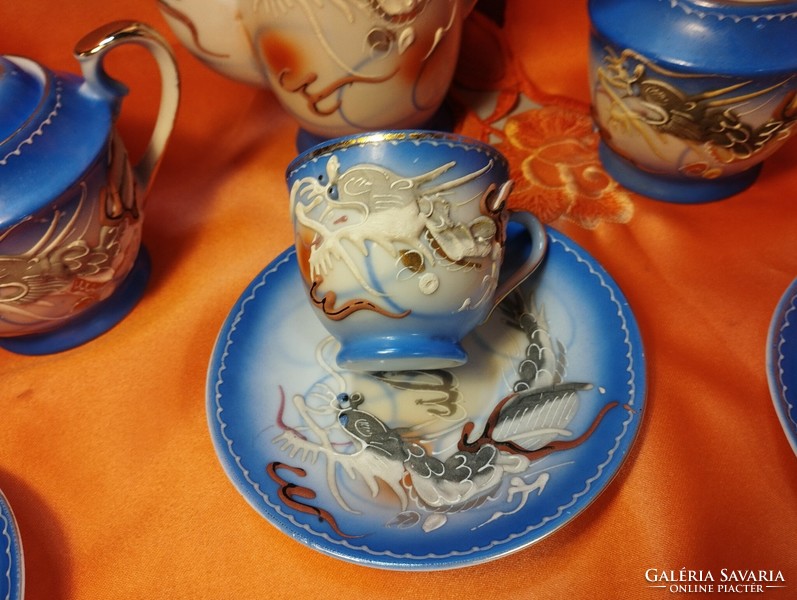 Japanese porcelain coffee set with a dragon pattern