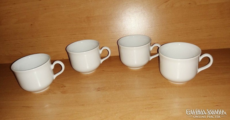 4 white porcelain coffee cups together (5/k)