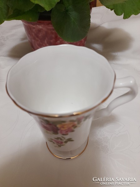 Beautiful English porcelain cup with a pink base.