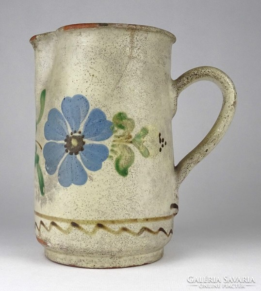 1Q627 old painted earthenware jug with flower decoration 18.5 Cm