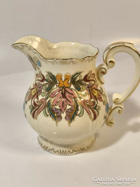 Zsolnay richly painted cream pourer with a rare pattern