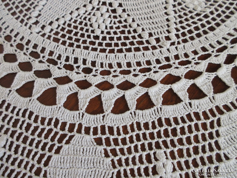 Old, large, circular, crocheted tablecloth. Negotiable!