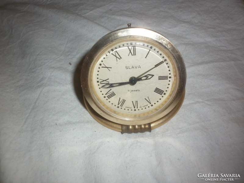 Old Slava wind-up table alarm clock