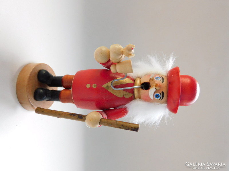 Vintage wooden man - with a wandering bird playing a pipe 13 cm