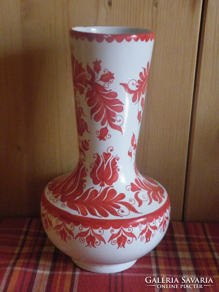 Glazed ceramic vase marked with an old folk floral pattern