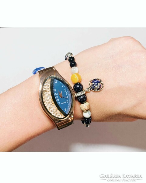 A wristwatch and unique mineral bracelet can be a great gift for Mother's Day