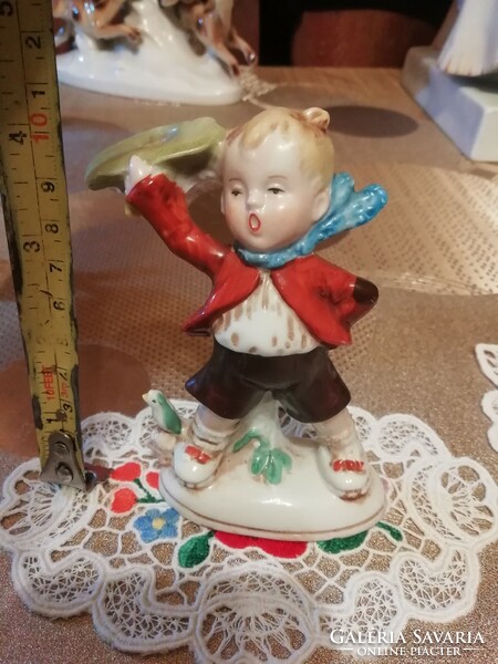 Antique porcelain boy from a German collection