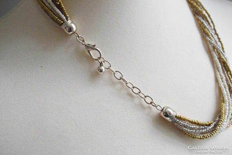 Nyaklánc arany , ezüst és fehér tekla gyöngy 10 szálas gyöngysor 54 cm