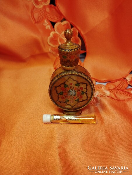 Original Bulgarian rose oil in a decorative wooden holder