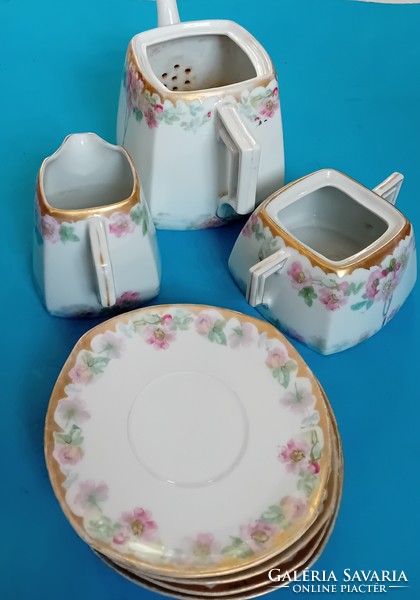 From a foreign painted tea set: milk jug with sugar and 4 plates