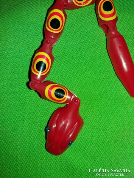 Retro traffic goods bazaar coiling plastic snake red 25 cm long according to the pictures 1.