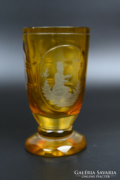 Amber glass cup with polished decoration