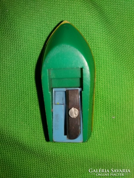 Retro 1970s paper shop plastic speedboat pencil sharpener as shown in the pictures