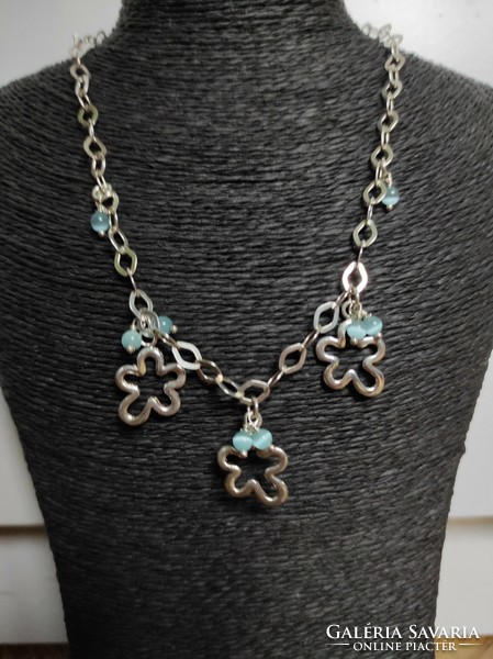 Silver necklace with flowers