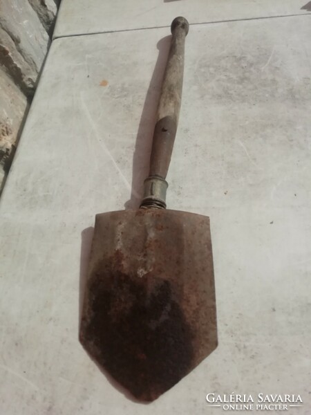 Old military spade in the condition shown in the pictures