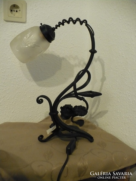 Special wrought iron table lamp.