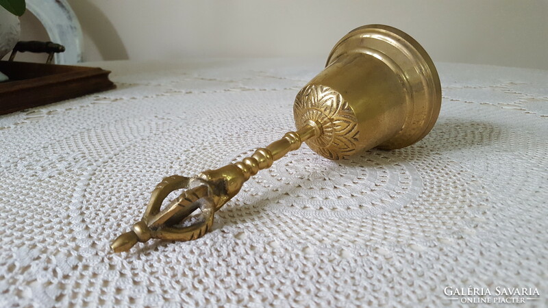 Brass hand bell, bell with face/head and crown handle