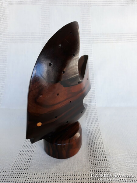 Art deco style fish carved from tropical wood