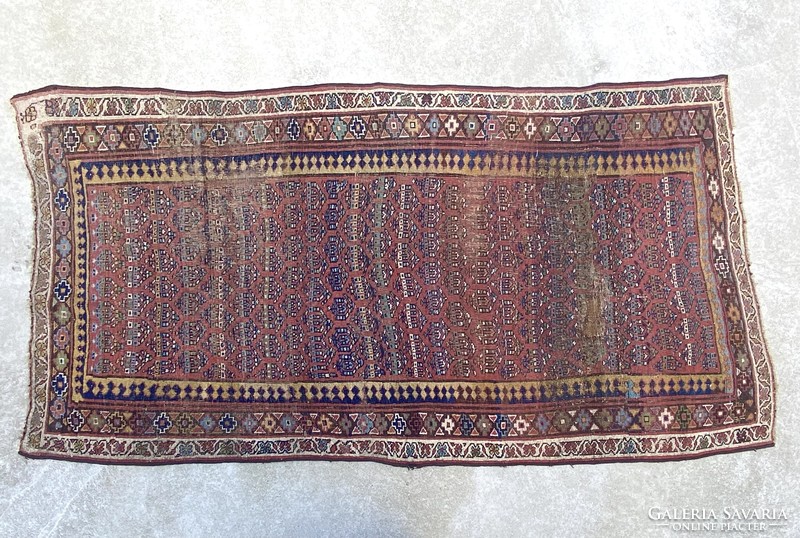 Antique oriental handwoven knotted rug 217 x 116 cm