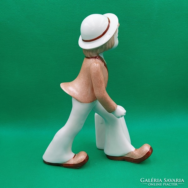 Retro walking boy porcelain figurine