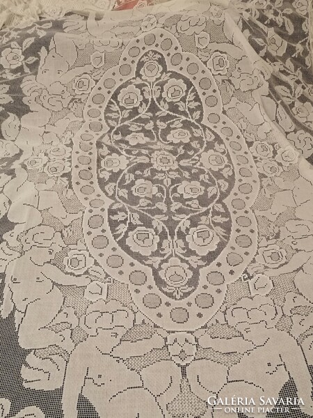 Hand-crocheted (270 cm x 160 cm) lace tablecloth with angel and rose pattern