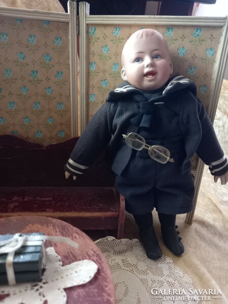 Antique doll with full head