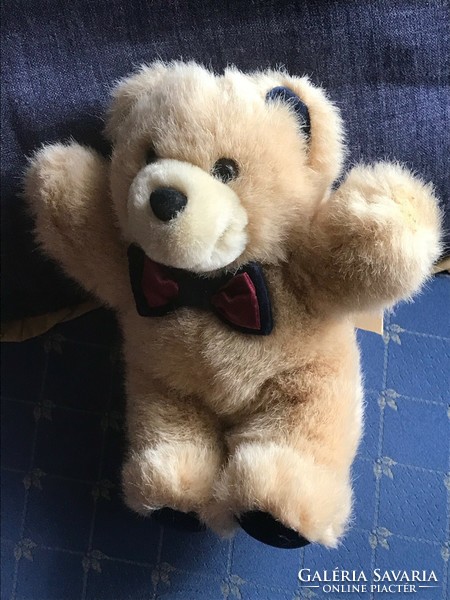 New! Bow tie teddy bear. I bought it in Austria. Size: 22 cm high and 12 cm wide. It's very fluffy.
