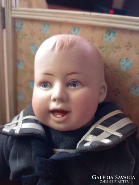 Antique doll with full head