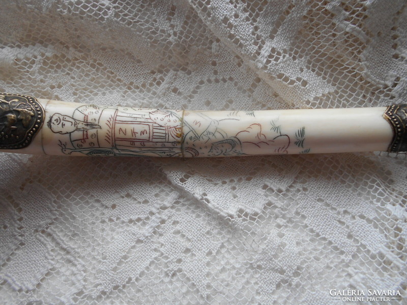 An opium pipe made of antique Chinese bone and metal, or just a beautifully crafted decorative item?