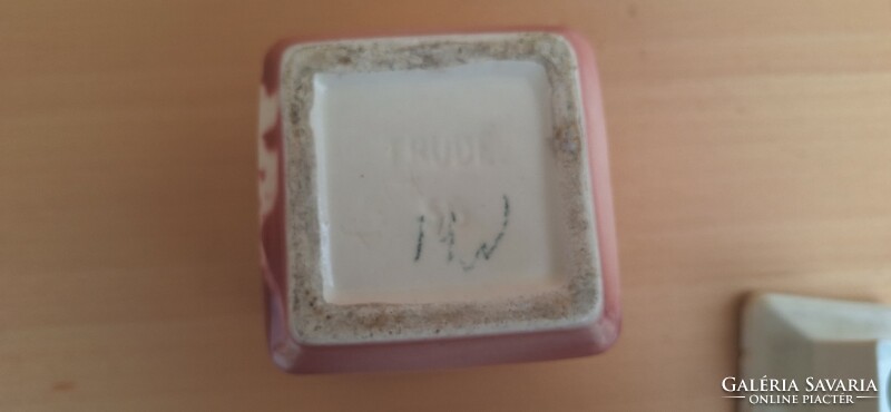 Old earthenware spice holder with inscription